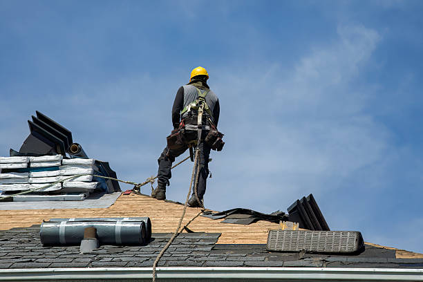 Professional Storm Damage Roof Repair technician working in Wrentham, MA